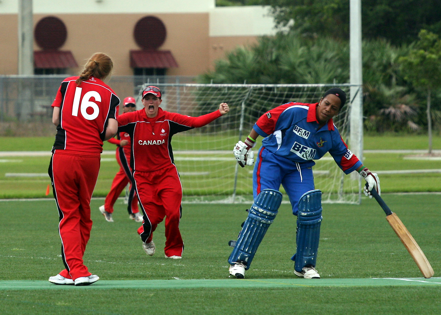 Mikaela Turik taking a caught and bowled catch against Bermuda